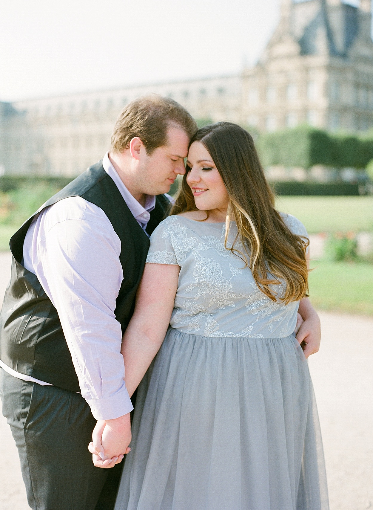 Paris engagement photo at the Tuileries Garden | by Abby Grace