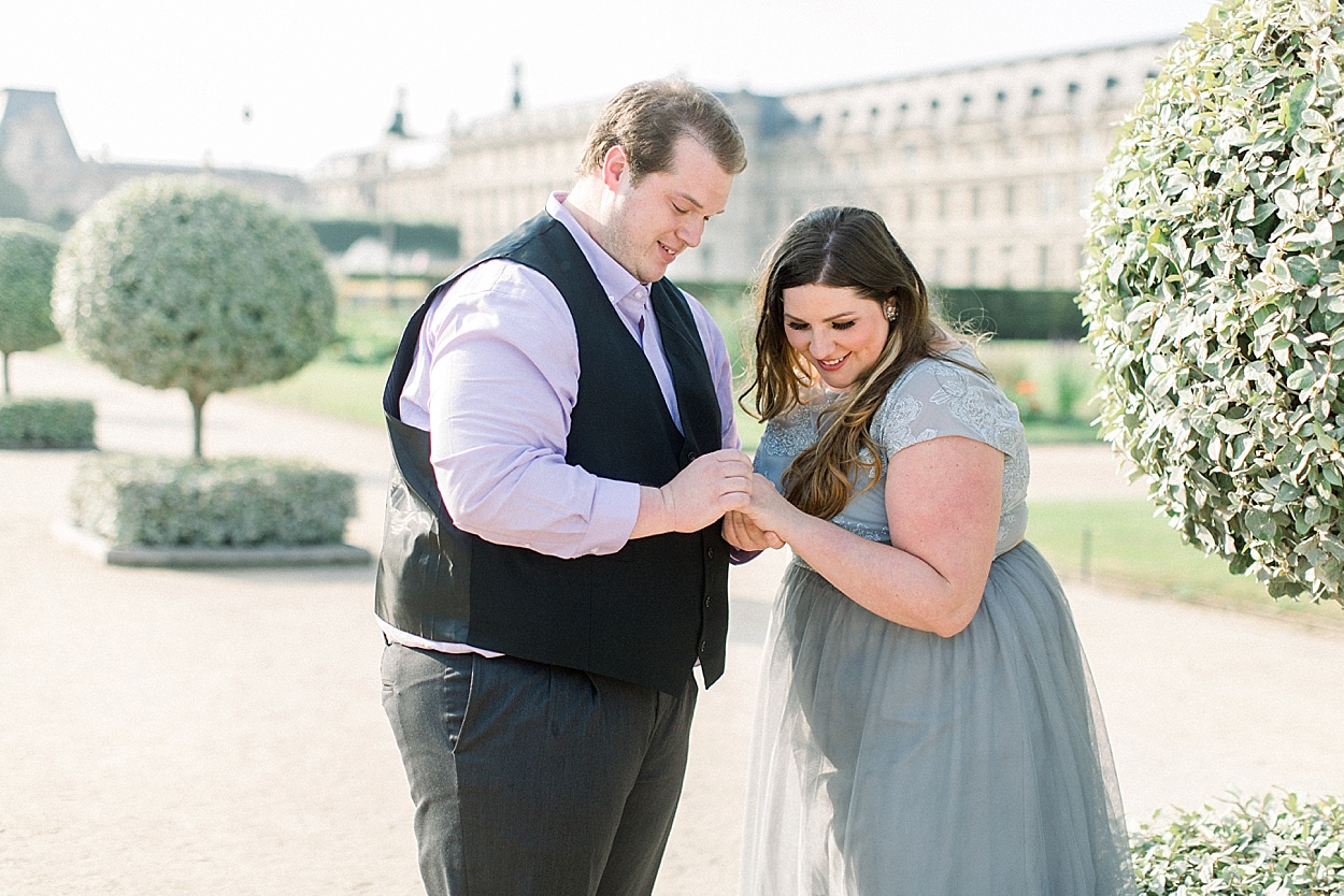 Paris engagement photo at the Tuileries Garden & Louvre | by Abby Grace