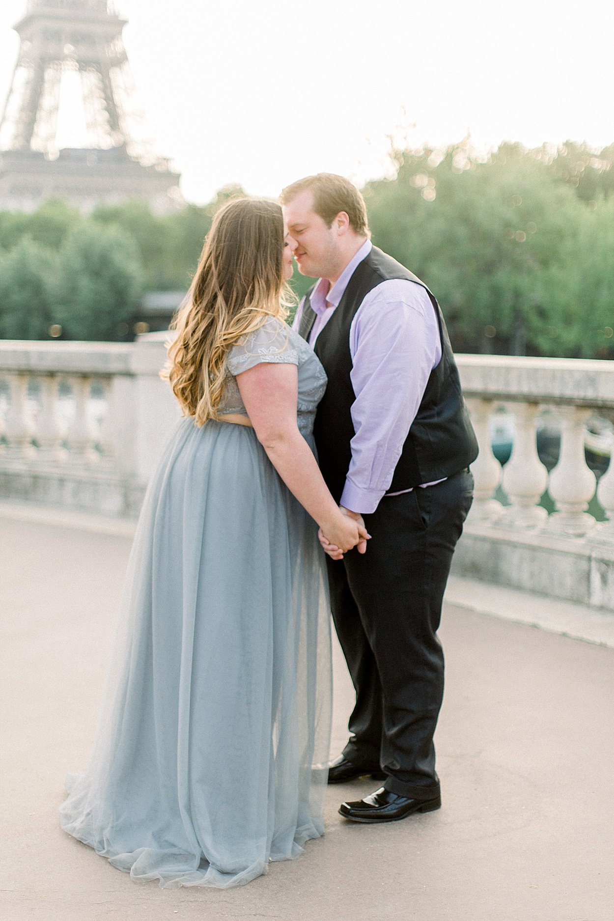 Paris engagement photo at the Eiffel Tower | by Abby Grace
